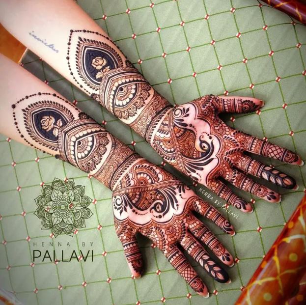 Amazing Full Hand Mehndi With Peacock Motifs